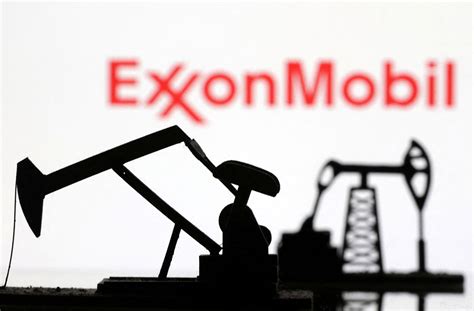 Exxon profit falls compared with record-setting numbers last year, but consolidation in full swing